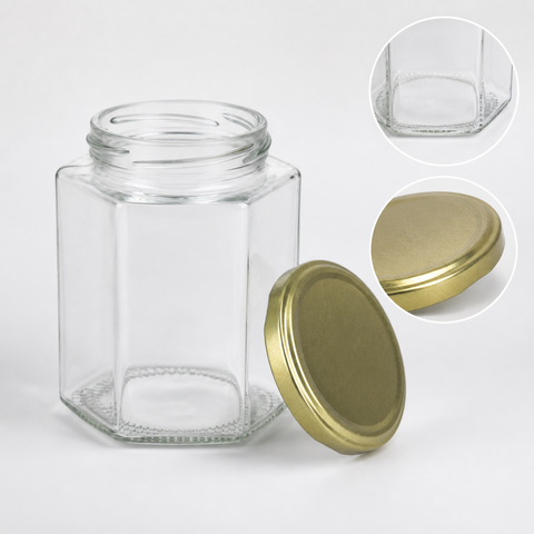Detalle de frasco hexagonal de vidrio 500 ml y tapa metálica dorada