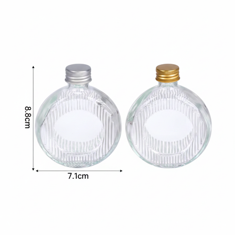 Botella de vidrio plana 50ml con medidas 7.1cm ancho x 8.8cm alto