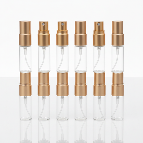 Set de 6 atomizadores de perfume de 3ml con vidrio transparente y tapa dorada vista frontal